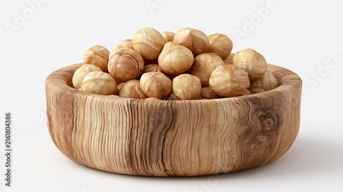 Macadamia Nuts in Wooden Bowl on White Background Soft Colors