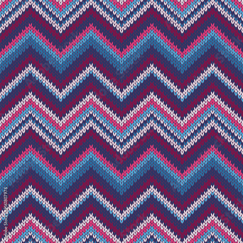 Seamless knitted pattern. Multicolored repeating team blue red white template. Knitwear sample. Vector illustration