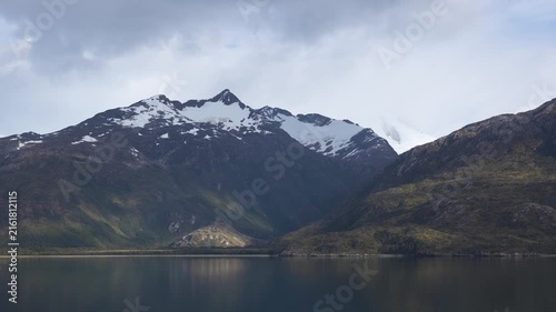 Sailing Tierra Del Fuego South America Argentina Antarctica. Wide View Mountains Covered in Snow. Seen From Cruise Ship. Nature Landscape Dramatic.
