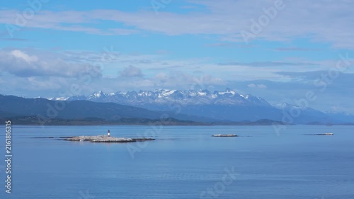 Lighthouse at the End of the World on Small Island. Les Eclaireurs. In Ushuaia Argentina. Strait of Magellan Antarctica Cruise. Small Boat Wide
