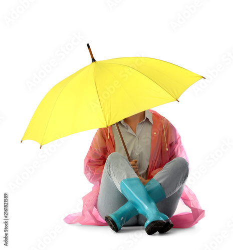 Konstfotografi Protection and shelter from problems, person sitting with a yellow umbrella cove