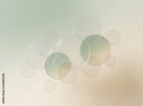 Overlapping translucent frosted acrylic discs on sage and cream gradient