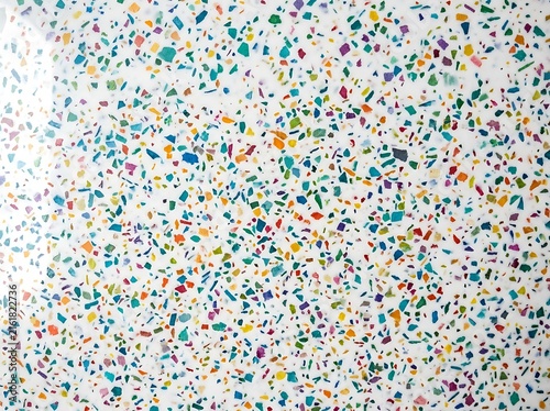 Sustainable eco-terrazzo surface with recycled paper flecks