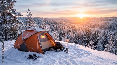 Cuadro en lienzo Camping tent in snowy forest at sunset with warm light