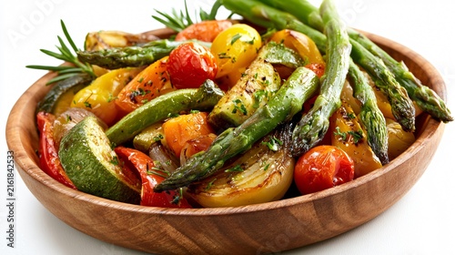 Delicious Roasted Mixed Vegetables in Wooden Bowl with Fresh Herbs and Asparagus