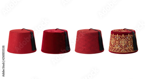 Fotografía Collection of traditional red velvet fez hats with tassel decorations
