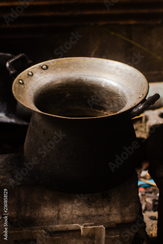 old Black curry pot countryside Thailand
