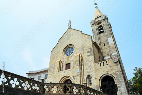 Fotografie Low angle view of ancient Portuguese Our Lady of Penha Chapel church with stone