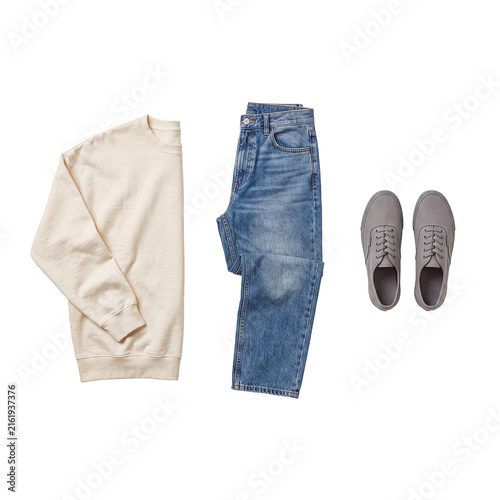 Quadro su tela Casual attire ensemble featuring a cream sweatshirt, blue denim jeans, and gray canvas sneakers, minimalist flat lay