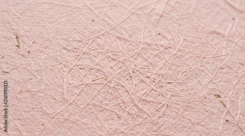 Close-up of Soft Blush Pink Luxury Paper Texture with Fine Wrinkles