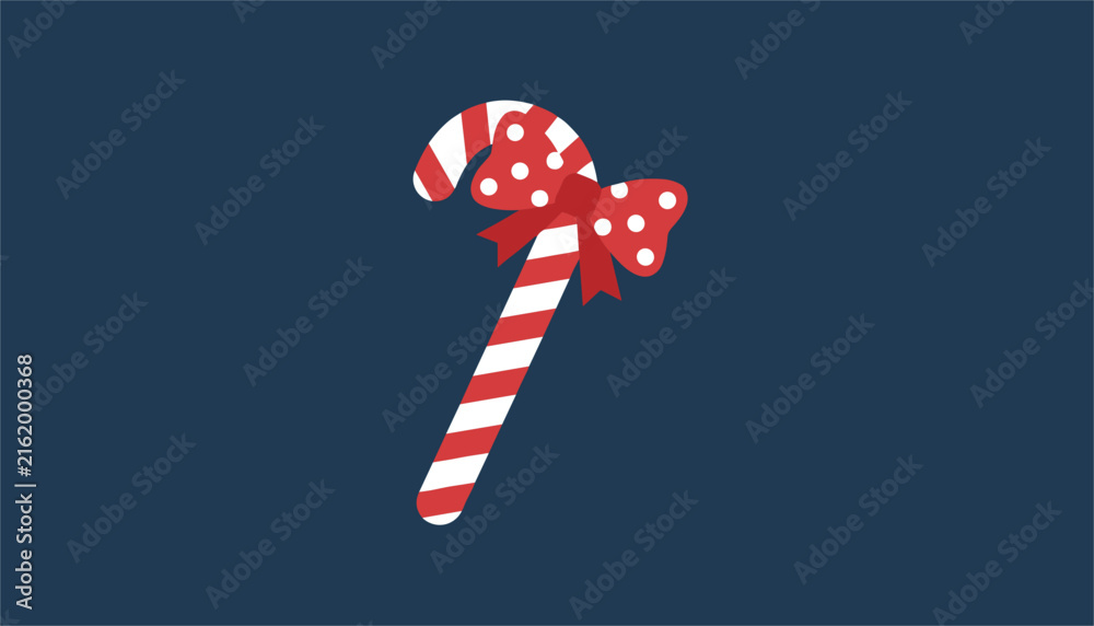 Obraz premium Traditional Christmas candy cane decorated with a festive red bow featuring white polka dots against a dark blue background.