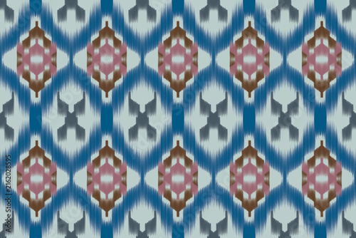 Seamless Ethnic Ikat Geometric Pattern Design with Complex Tribal Motifs and Diamond Shapes in Blue, Brown, and Pink