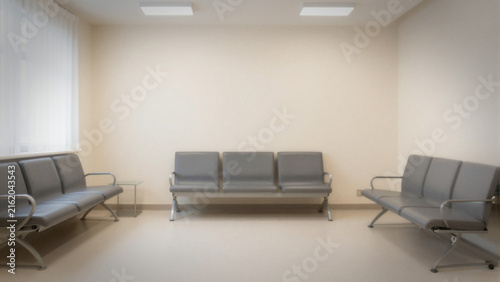 Modern empty waiting room with grey metal chairs and clean minimal interior design