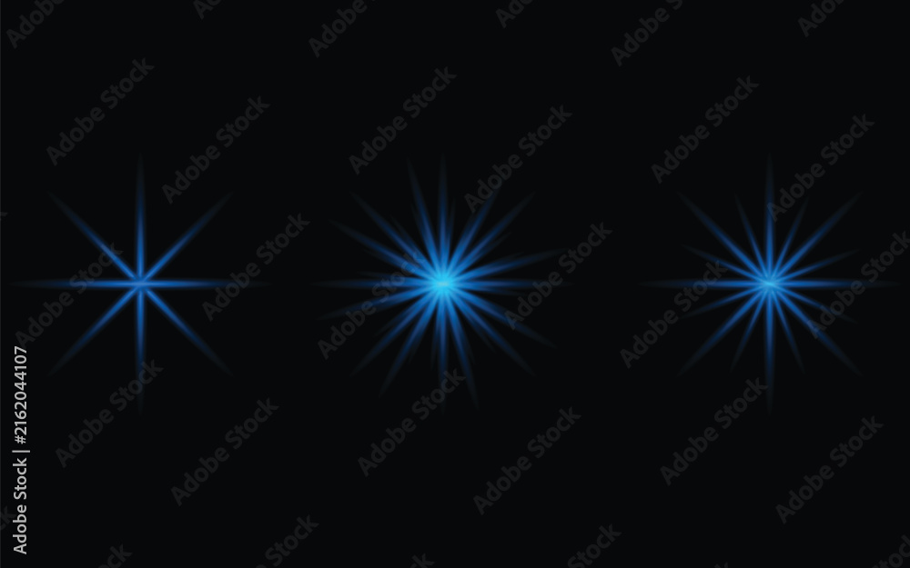 Fototapeta premium Set of blue glowing starburst light effect elements