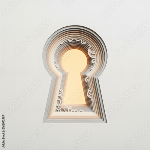 Keyhole design with intricate patterns and soft light background
