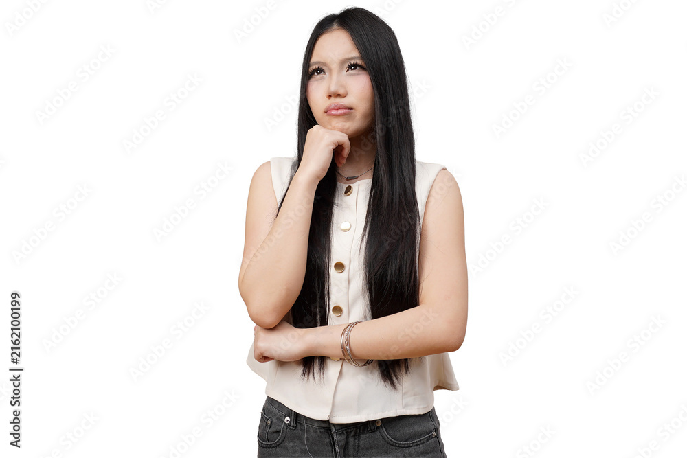 Obraz premium Thoughtful Young Asian Woman Looking Up While Thinking in Studio