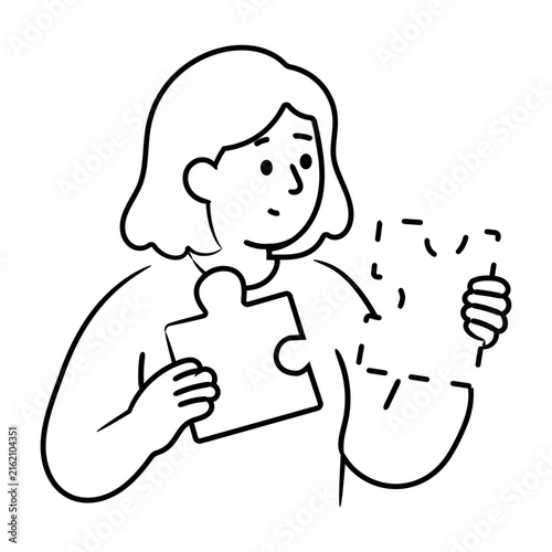 Obraz na plátně A person holding a puzzle piece while examining a missing or incorrect connection