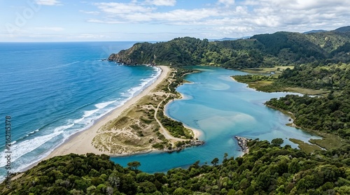 Breath-taking Aerial View of a Narrow Sand Spit Separating the Blue Ocean Waves from a Tranquil Turquoise Coastal Lagoon