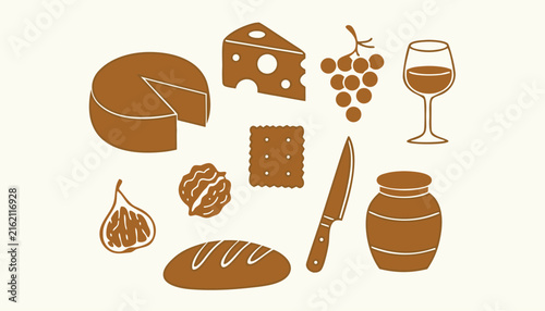 Gourmet snack collection including cheese wedge cheese wheel grapes wine glass cracker knife fig bread and honey jar
