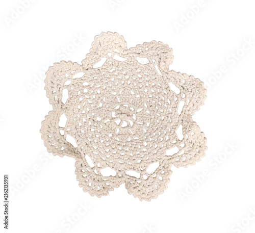 Obraz na płótnie Intricate star shaped crochet lace doily with detailed openwork pattern on a tra