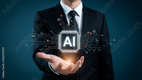 Man in suit holding digital ai chip with glowing circuits on dark blue background, artificial intelligence