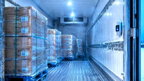 Stacked pallets inside refrigerated cold storage warehouse