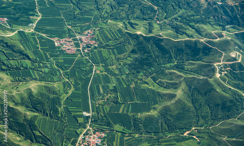 aerial view of green agriculture field in mountain area