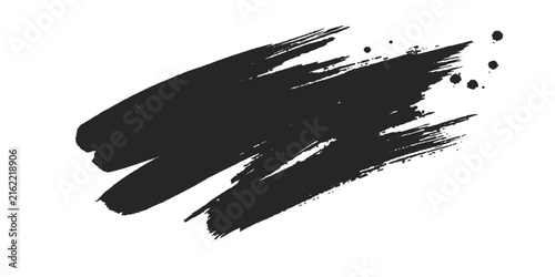 Abstract black paint brushstroke with splatter effect against a clean white background, perfect for graphic design elements.