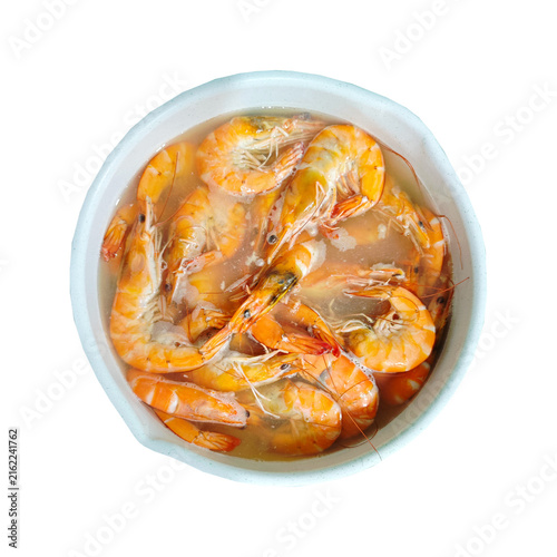 Shrimp boiling in water on an isolated background. Close up.
