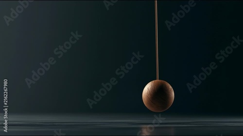 Single Pendulum Swinging with Wooden Sphere in a Dark Room