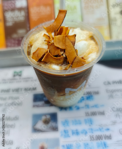 Iced coffee in a glass. Close up.   Street café.