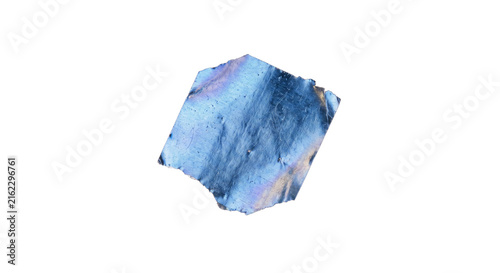 Konstfotografi Iridescent blue and gold mineral fragment with rough edges and textured surface