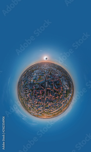 Aerial Little Planet Cityscape of Worms Germany During a Solar Eclipse