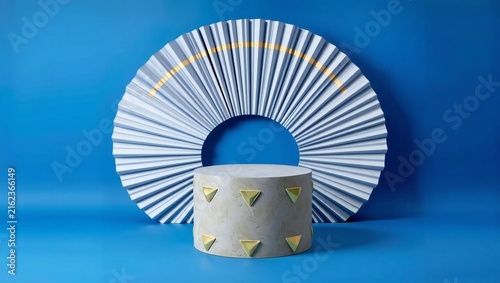 Cylinder product display podium with a decorative pleated paper fan on a bright blue background