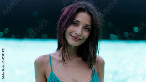 Bright aqua pool portrait with soft bokeh and smiling expression for summer banner and lifestyle background