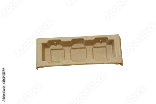 cardboard tray-insert for protecting goods during transportation isolated, Packaging tray made of molded paper fiber on a white background