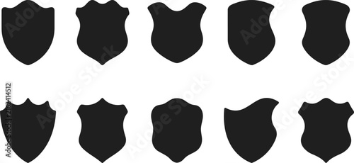 Set of ten black shield silhouettes in various shapes for heraldry and logo design elements on white