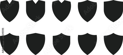 Set of ten different black shield silhouettes isolated on a white background for heraldry and logo design