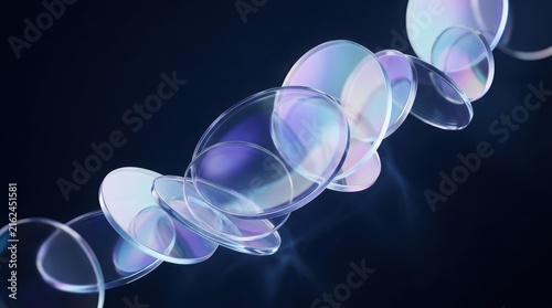 Elegant wave of transparent glass discs with rainbow spectral colors on black background.