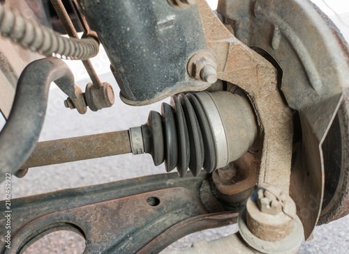 Obraz na płótnie Car drive shaft and CV joint with rubber boot