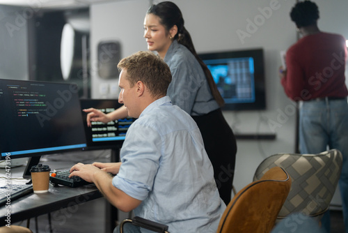 Photography Diverse male and female programmers teamwork coding collaboration in modern IT o