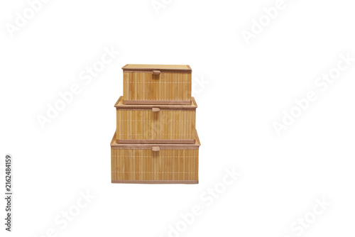 Stack of three bamboo storage boxes isolated on white background, Eco-friendly bamboo containers-organizers, stacked one on top of the other