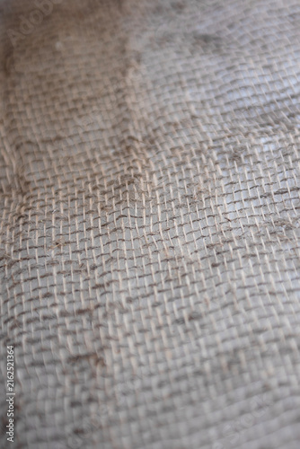 Natural burlap background, selective focus, close‑up