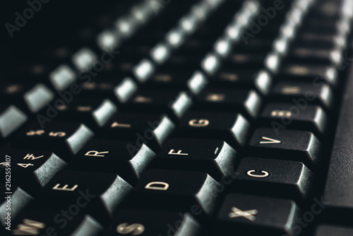 Konstfotografi Close-up of a black computer keyboard, showcasing textured keys and a shallow depth of field