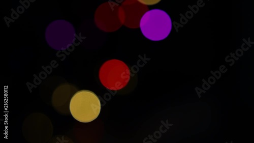 Out of focus blue and green bokeh lights on a dark black background, Blue bokeh lights on black background