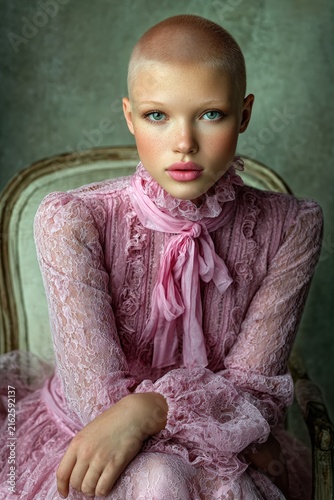 Stylish Portrait of a Child Model with Pink Hairstyle and Lace Embellishment