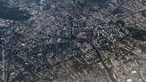 4k aerial video footage, flying across City of Berlin, Capital of Germany - from Alexanderplatz with Fernsehturm, Tiergarten park to western part of Berlin with Olympiastation and closed Airport Tegel
