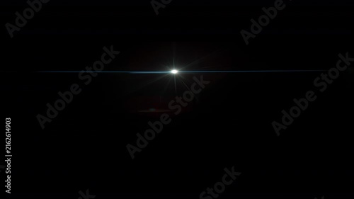 Real Shooted Anamorphic Lens Flare on Black Background in Super Slow Motion.