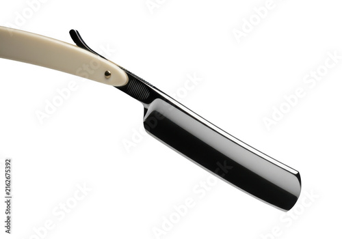 A closeup of a straight razor with a white handle isolated on transparent background
