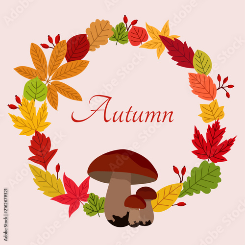 Autumn wreath with colorful fall leaves, mushrooms and berries